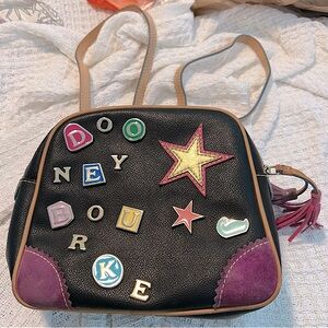 free shipping with full price offer rare Dooney Bourke CHARMS BACKPACK